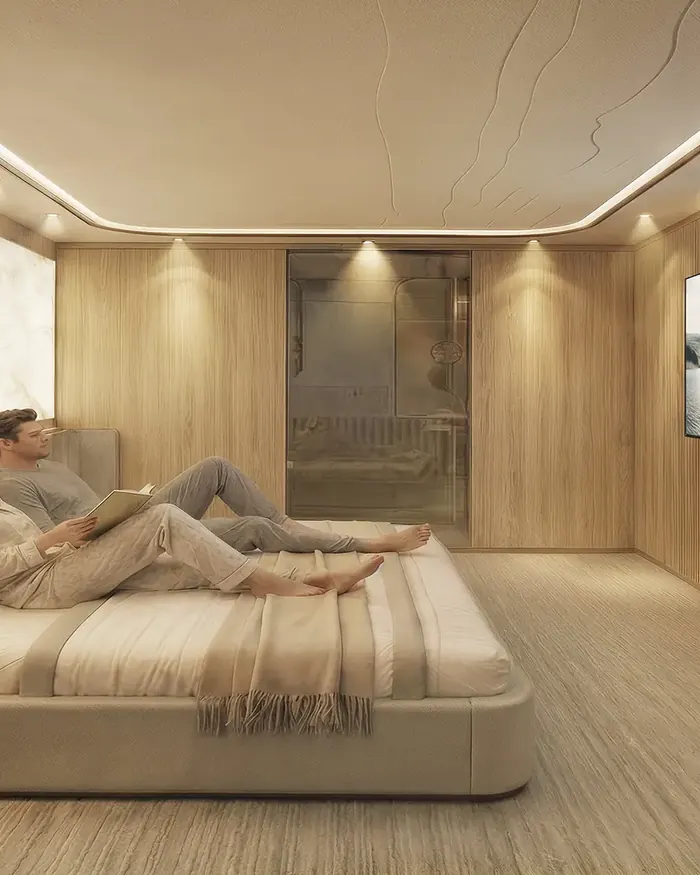Een gast leest in de grand master suite
